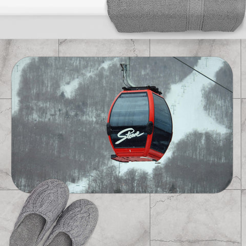 a ski lift with a pair of feet on the ground
