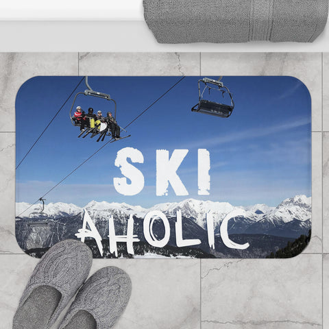 a pair of feet are standing on a ski lift