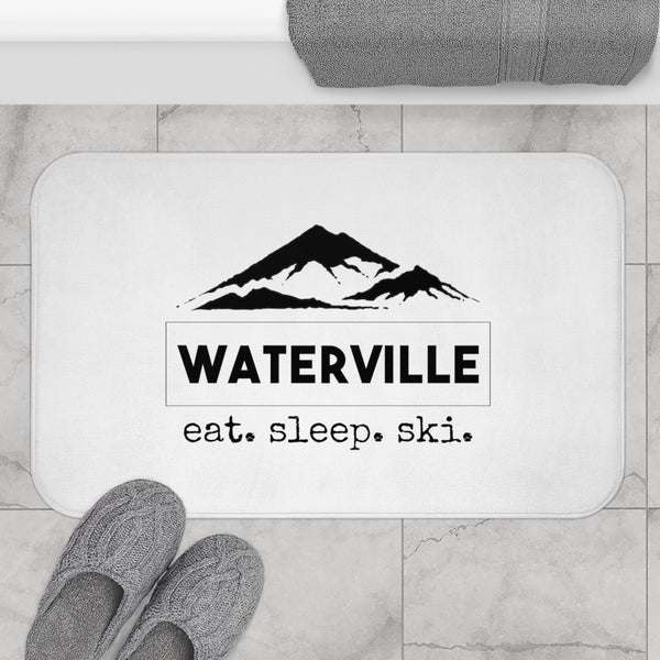 a bathroom rug with the words waterville eat sleep ski on it
