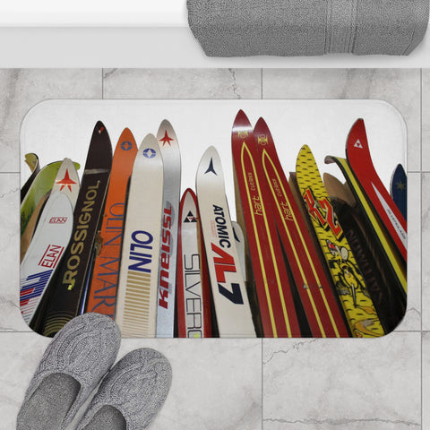 a pair of feet are standing in front of surfboards