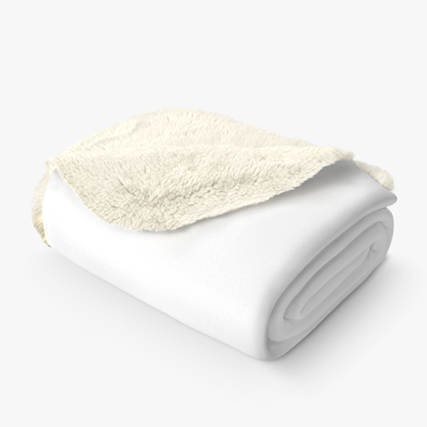 a blanket with a white blanket on top of it