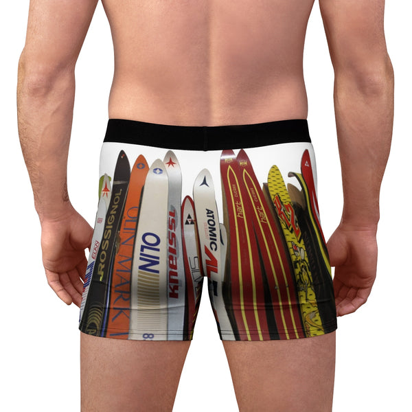 a man with his back to the camera wearing a pair of swim trunks