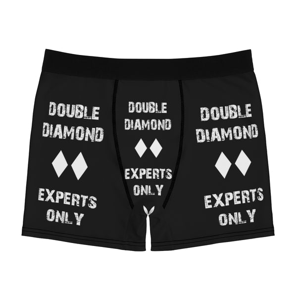 a pair of black boxers with white diamonds on them