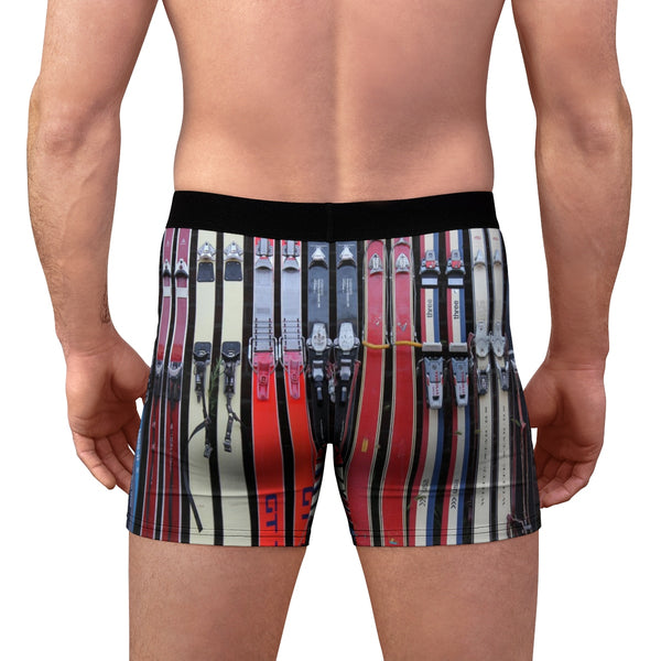 a man wearing a pair of skis printed boxer shorts