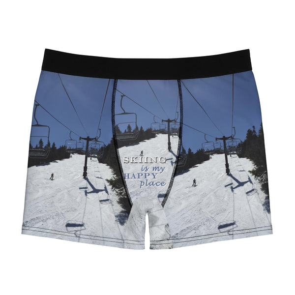 a pair of shorts with a ski lift in the background