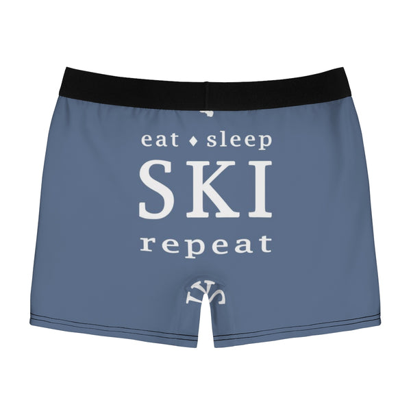 a blue boxer shorts with the words eat sleep ski repeat
